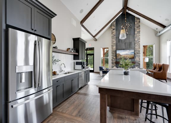 Clubhouse Kitchen with Large Kitchen Island and Stainless Steel Appliances