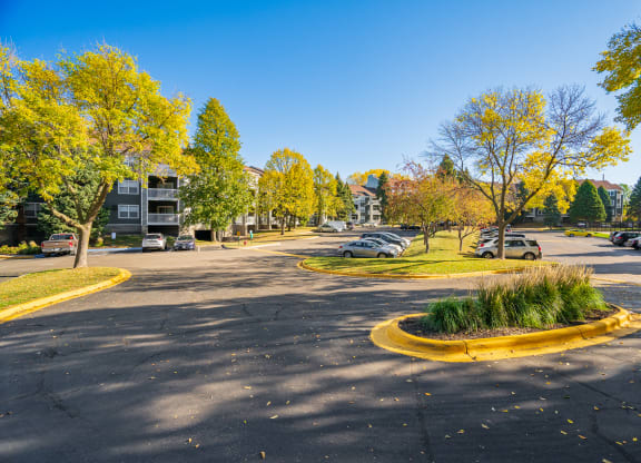 Parking Lot In Front Of Apartment Homes At The Apex
