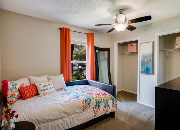 Bedroom with Large Window and Double Closets