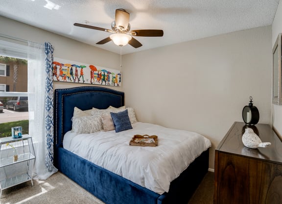 Bedroom with Ceiling Fan and Light