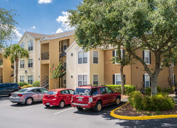 Large Trees Surrounding an Apartment Building at The Carrington at Four Corners