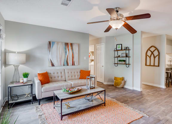 Open Concept Living with Ceiling Fan and Light