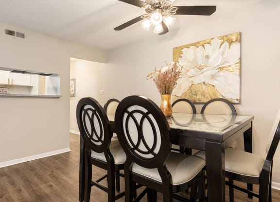 Dining Room Area Adjacent to the Kitchen with Peek Through Window