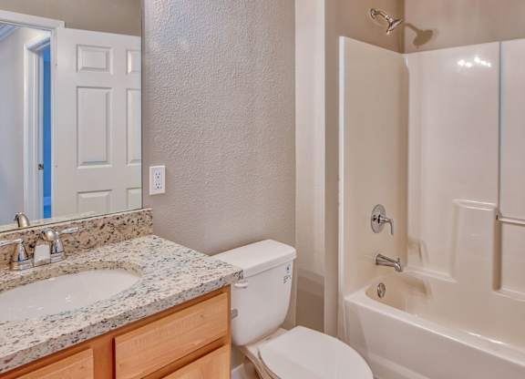 Bathroom with Wood cabinetry