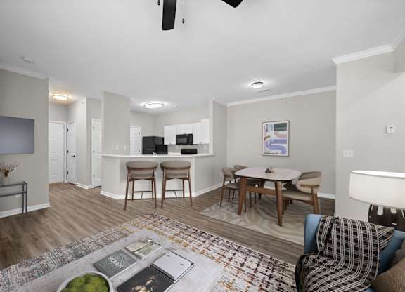 Spacious Living Area With Wood-Style Flooring