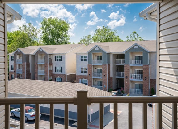 a view of an apartment building from a balcony