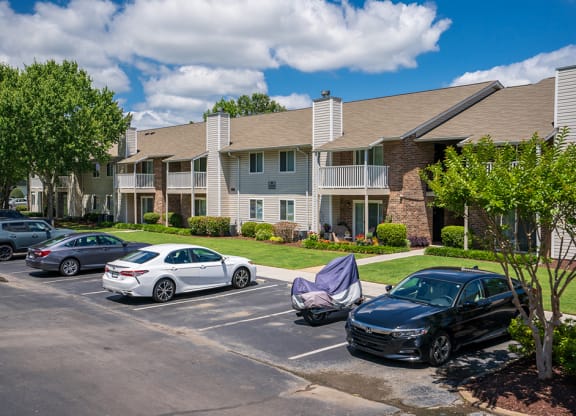 Parking Lot in Front of The Villas at Oak Crest Apartment Building