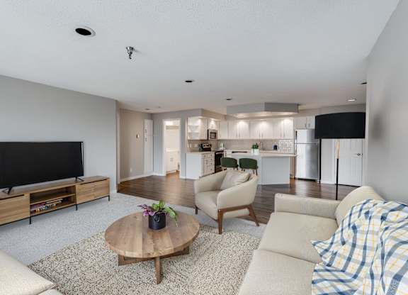 Spacious Living Area with Carpet