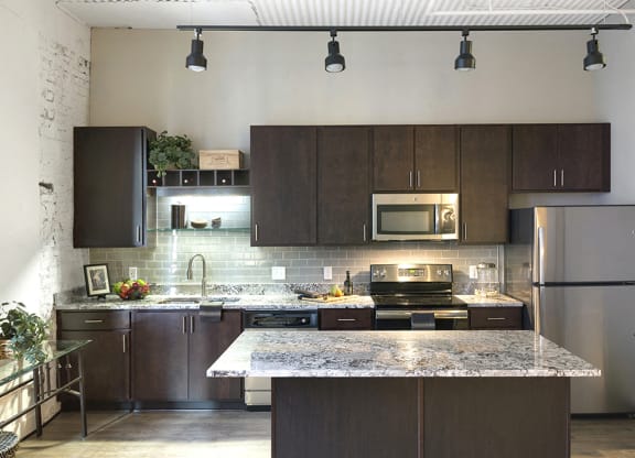 Open Concept Kitchen with Stainless Steel Appliances