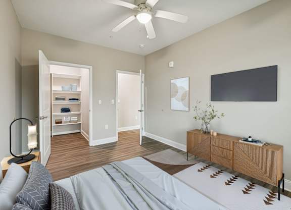 Bedroom with Wood-style flooring