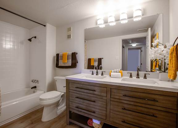 Bathroom with double vanity at Los Altos Towers Apartments in Albuquerque NM