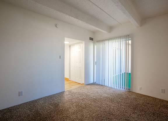 Bedroom with carpet at Los Altos Towers Apartments in Albuquerque NM