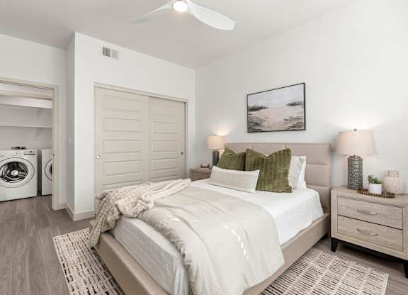 Bedroom with Washer and Dryer in Two Bedroom and Two Bath at Lucero Apartment Homes in Phoenix Arizona