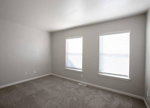 Bedroom with Window View at The Bluffs at Tierra Contenta Apartments in Santa Fe New Mexico