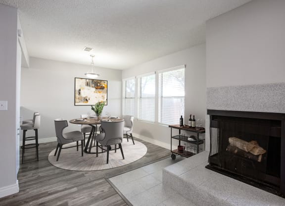 Dining Area and Fire Place at Orange Tree Village Apartments in Tucson Arizona June