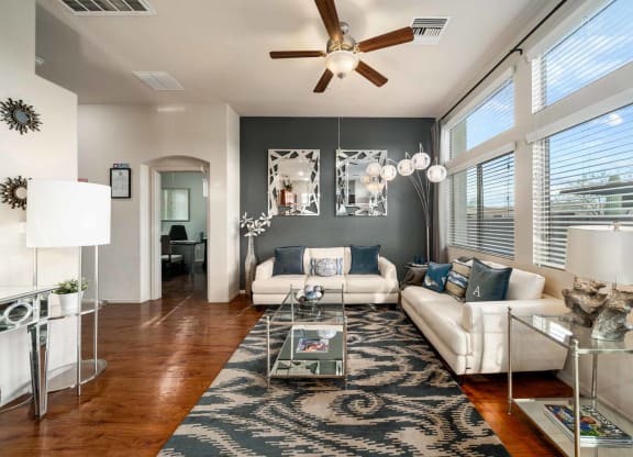 Full Living Room with Ceiling Fan at Avilla Preserve Apartment Homes in Tucson Arizona