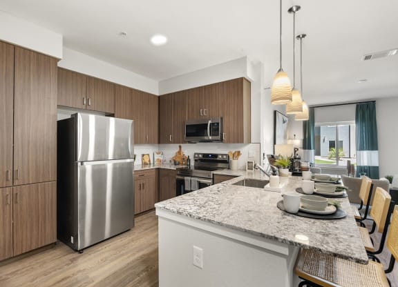 Gourmet Kitchen with Custom Cabinetry at Tucson Landing, Tucson, AZ 85714  