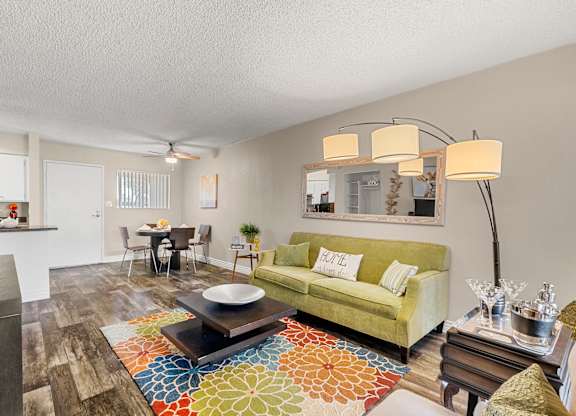 One bedroom Living room and dining area at Villa Toscana Apartments in Phoenix Arizona