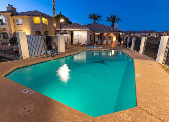 Pool at night at Stone RIdge Apartments in Bullhead City