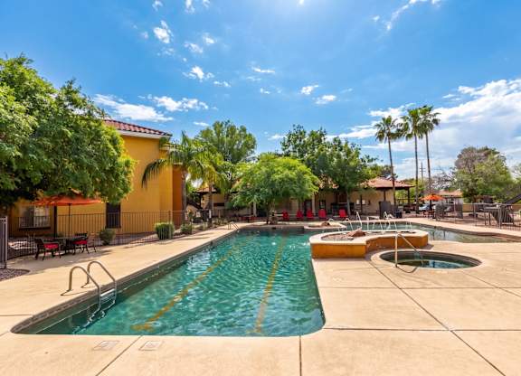 A sunny day at the pool with a clear blue sky.