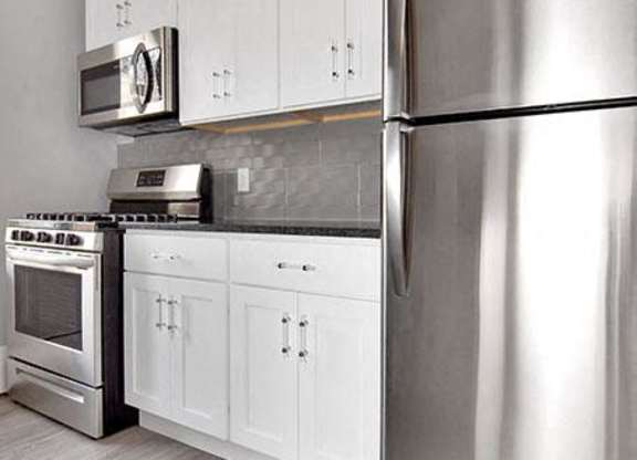 kitchen with appliances at Springwood Gardens, New Britain, CT