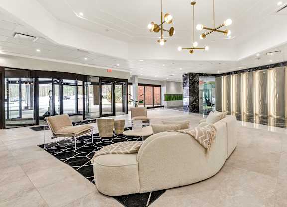 a large living room with a couch and chairs at Up House, Connecticut
