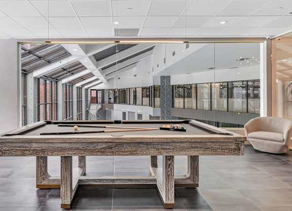 a billiards table in the lobby of an office building at Up House, Farmington, 06032