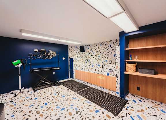 a recording studio with blue walls and a white and blue tile floor at Up House, Farmington, CT