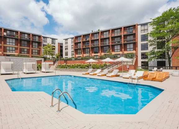 a swimming pool in front of a hotel at Up House, Farmington, CT, 06032