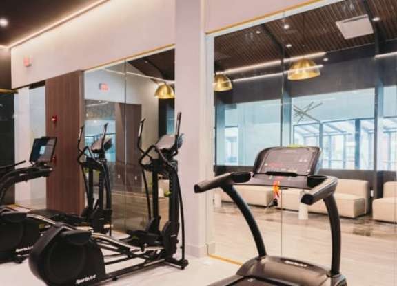 a gym with a lot of equipment in it at Up House, Connecticut, 06032