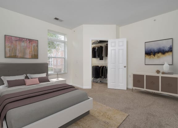 a bedroom with a bed and a closet