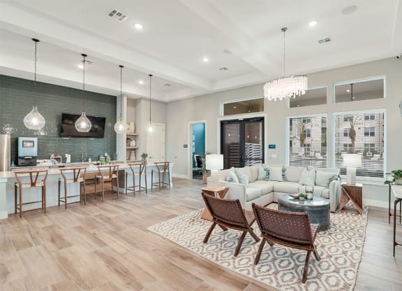 clubroom with kitchen and seating area