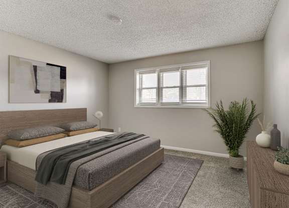 A bedroom with a large bed and a potted plant.