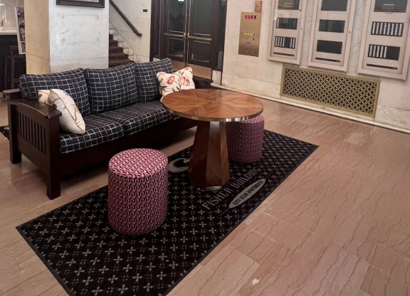 a living room with a couch and a table