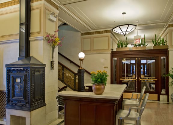 a dining room with a table and chairs and a fireplace
