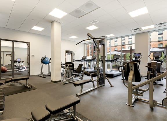 a gym with cardio equipment and weights in the new yorker magazine building
