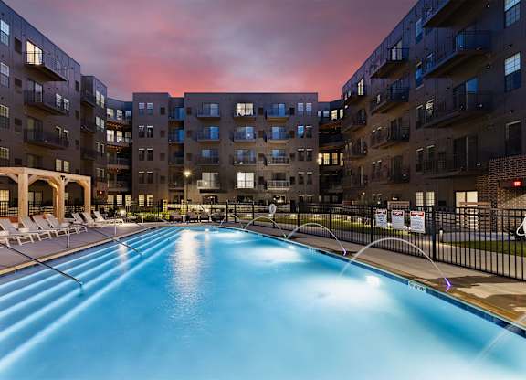 A large indoor swimming pool in a residential building.