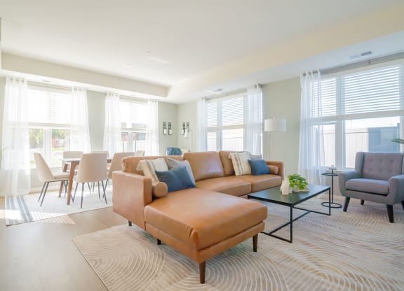 a living room with a couch and a table