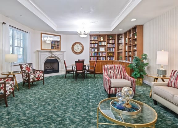 a living room filled with furniture and a fireplaceat Arbor Oaks at Greenacres, Greenacres, FL