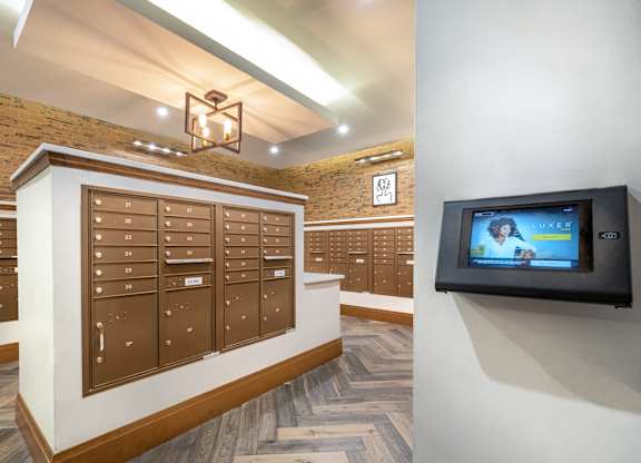 a vaulted ceiling with a television in a closet