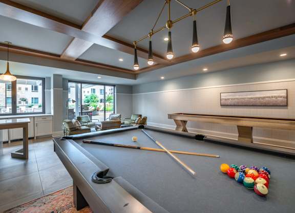 pool table in clubhouse at the estates apartments