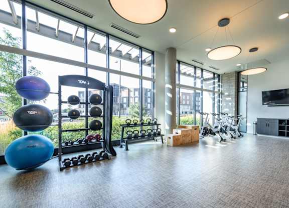 the gym at the flats at big tex apartments