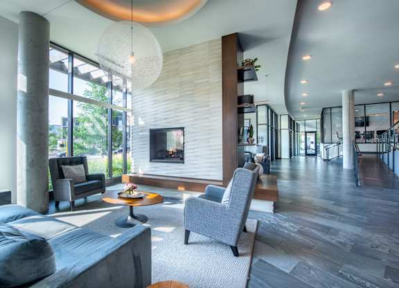 a living room with a fireplace and a couch