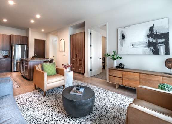 a living room with a couch and a table