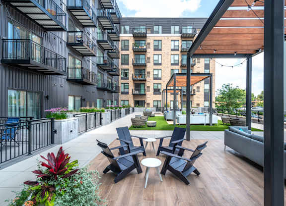 a room with chairs and a wall with a graphic on it