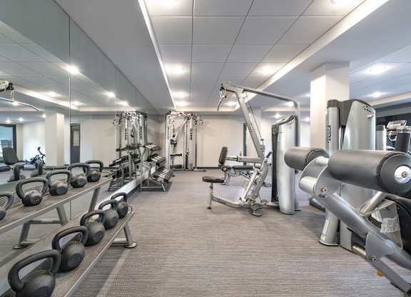 a gym with weights and other exercise equipment