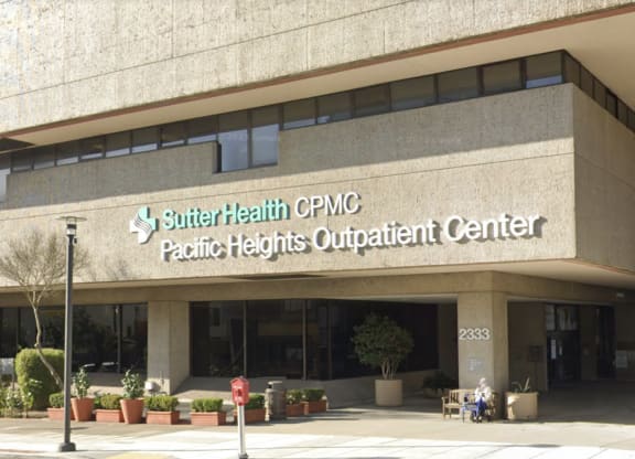 a sign on the front of a building that says southern pacific ovc pacific heights