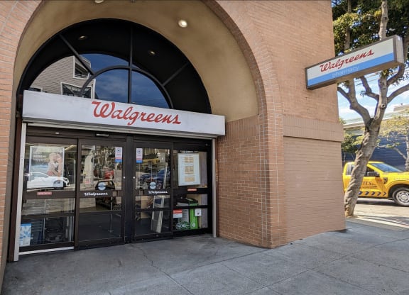 a walgreens store front with a sign above the door