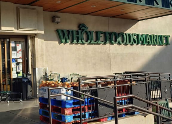a store front with a sign that says whole foods market