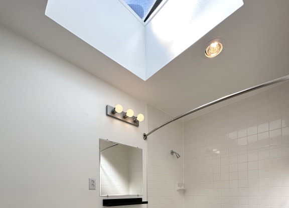 a bathroom with a toilet sink and bathtub